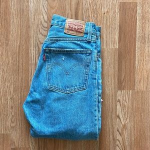 Levi’s 501 ripped jeans